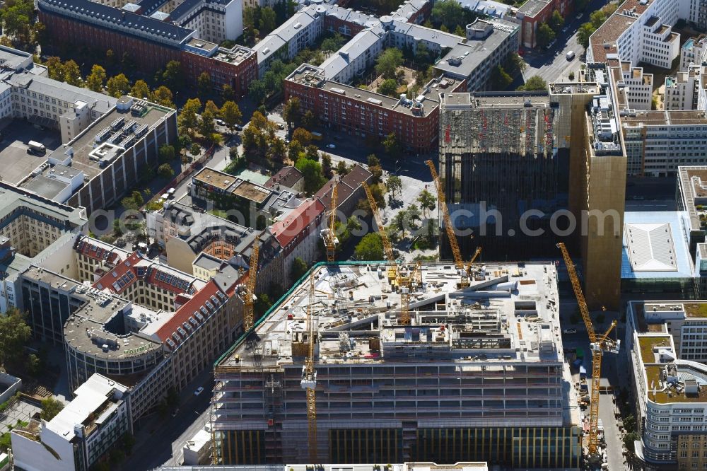 Aerial photograph Berlin - Construction site with pile foundation work for the foundation plate of the new building Axel Springer Campus - OMA to Krausenstrasse - Schuetzenstrasse in Berlin