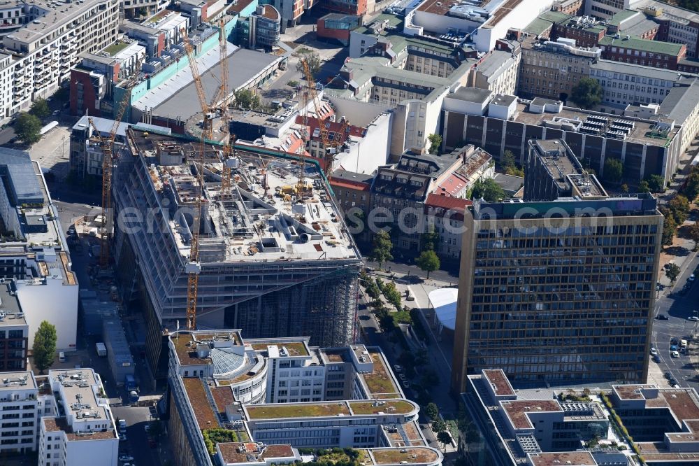 Berlin from above - Construction site with pile foundation work for the foundation plate of the new building Axel Springer Campus - OMA to Krausenstrasse - Schuetzenstrasse in Berlin