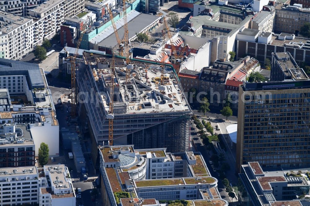 Berlin from the bird's eye view: Construction site with pile foundation work for the foundation plate of the new building Axel Springer Campus - OMA to Krausenstrasse - Schuetzenstrasse in Berlin