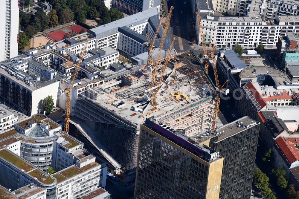 Aerial image Berlin - Construction site with pile foundation work for the foundation plate of the new building Axel Springer Campus - OMA to Krausenstrasse - Schuetzenstrasse in Berlin