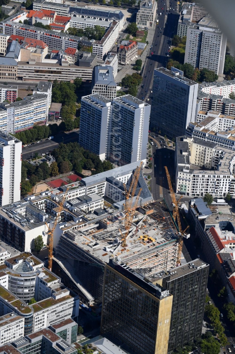 Aerial photograph Berlin - Construction site with pile foundation work for the foundation plate of the new building Axel Springer Campus - OMA to Krausenstrasse - Schuetzenstrasse in Berlin