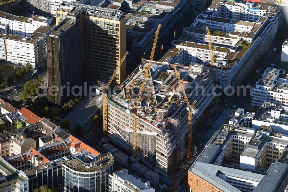 Berlin from above - Construction site with pile foundation work for the foundation plate of the new building Axel Springer Campus - OMA to Krausenstrasse - Schuetzenstrasse in Berlin