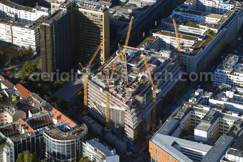 Berlin from the bird's eye view: Construction site with pile foundation work for the foundation plate of the new building Axel Springer Campus - OMA to Krausenstrasse - Schuetzenstrasse in Berlin