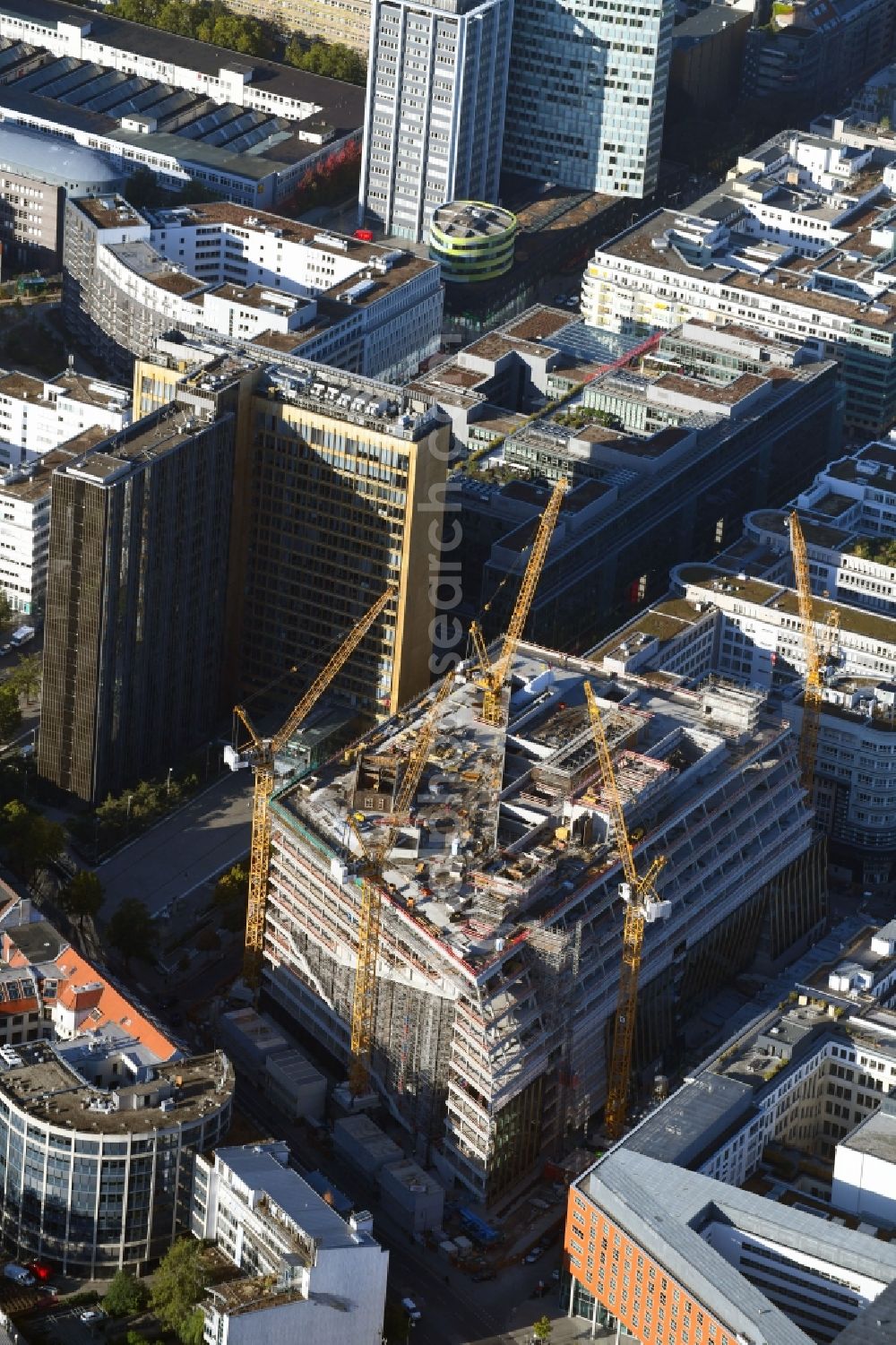 Aerial image Berlin - Construction site with pile foundation work for the foundation plate of the new building Axel Springer Campus - OMA to Krausenstrasse - Schuetzenstrasse in Berlin