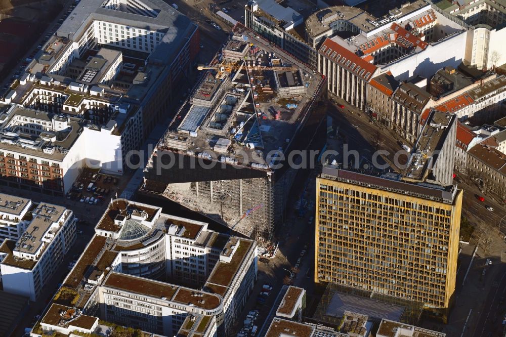 Berlin from above - Construction site with pile foundation work for the foundation plate of the new building Axel Springer Campus - OMA to Krausenstrasse - Schuetzenstrasse in Berlin