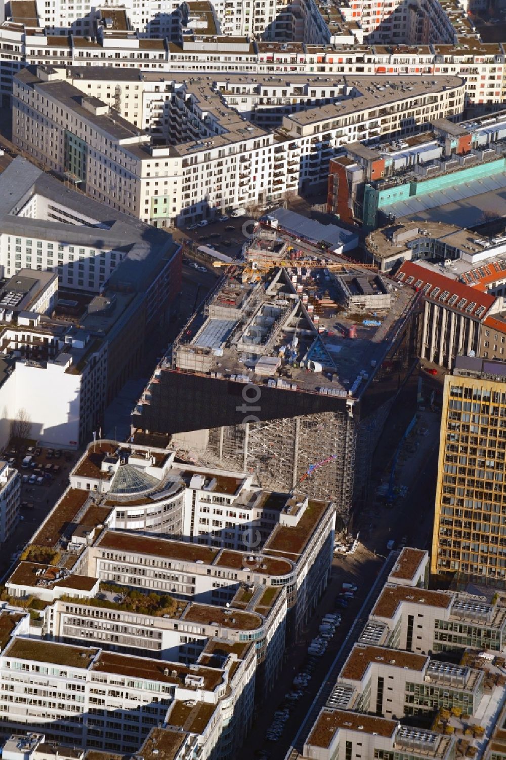 Berlin from the bird's eye view: Construction site with pile foundation work for the foundation plate of the new building Axel Springer Campus - OMA to Krausenstrasse - Schuetzenstrasse in Berlin