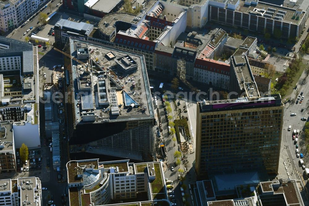 Berlin from the bird's eye view: Construction site with pile foundation work for the foundation plate of the new building Axel Springer Campus - OMA to Krausenstrasse - Schuetzenstrasse in Berlin