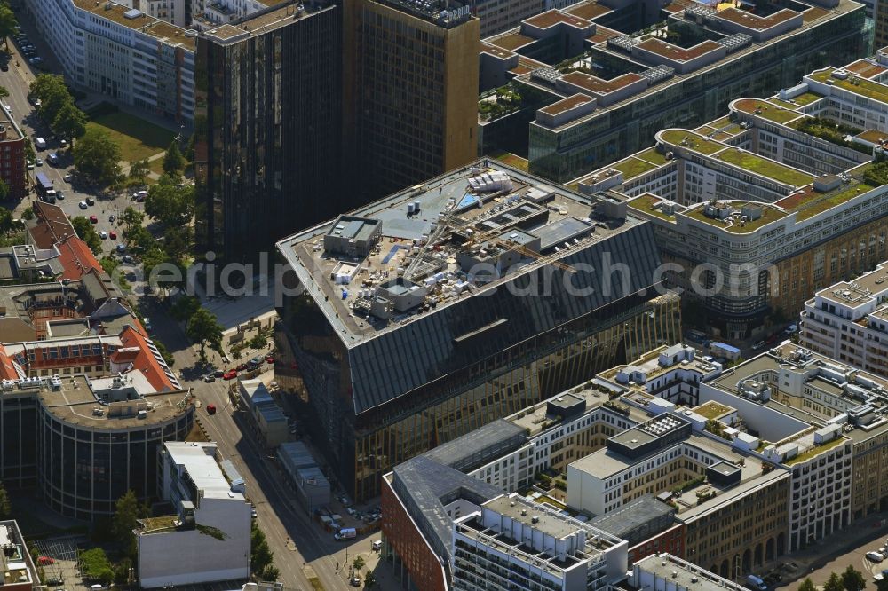 Berlin from the bird's eye view: Construction site with pile foundation work for the foundation plate of the new building Axel Springer Campus - OMA to Krausenstrasse - Schuetzenstrasse in Berlin