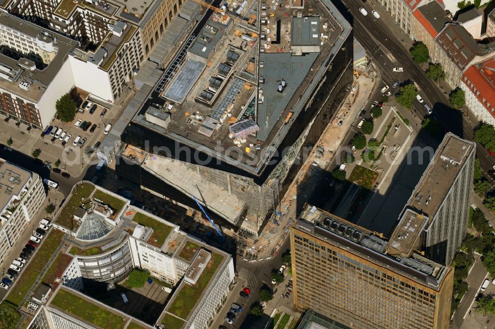 Aerial image Berlin - Construction site with pile foundation work for the foundation plate of the new building Axel Springer Campus - OMA to Krausenstrasse - Schuetzenstrasse in Berlin