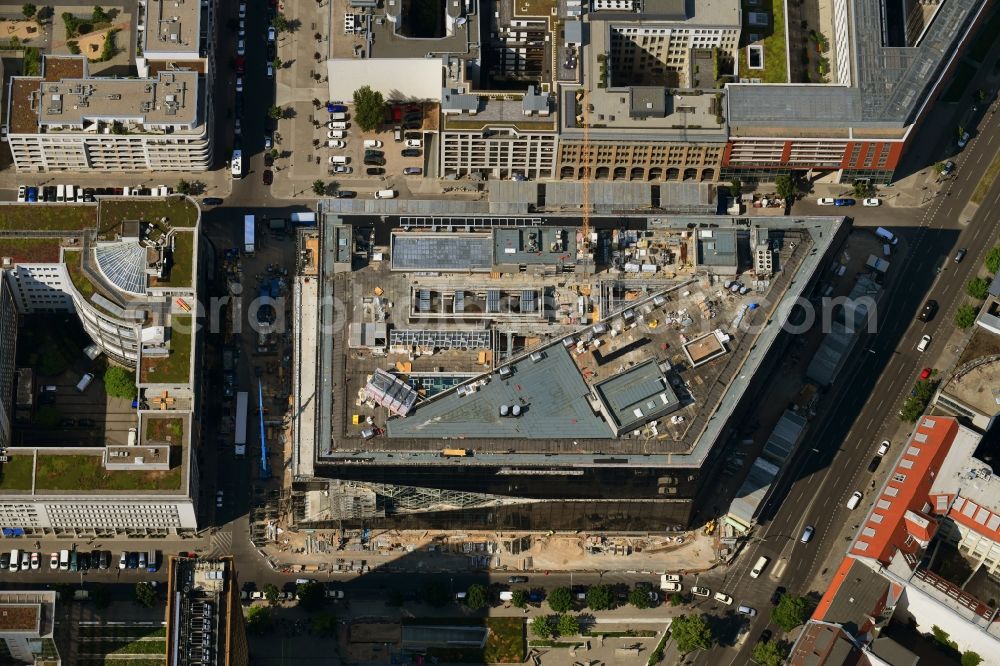 Berlin from the bird's eye view: Construction site with pile foundation work for the foundation plate of the new building Axel Springer Campus - OMA to Krausenstrasse - Schuetzenstrasse in Berlin