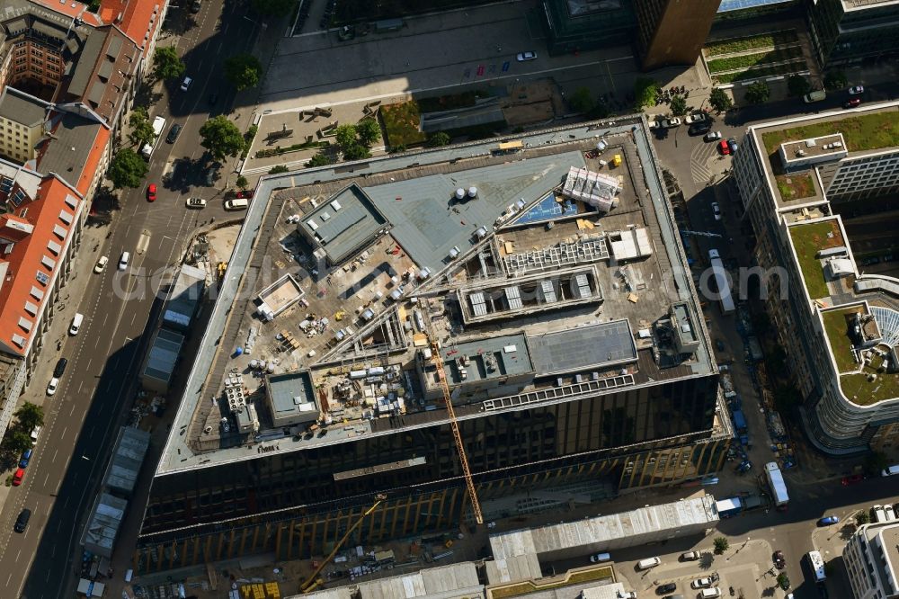 Aerial image Berlin - Construction site with pile foundation work for the foundation plate of the new building Axel Springer Campus - OMA to Krausenstrasse - Schuetzenstrasse in Berlin