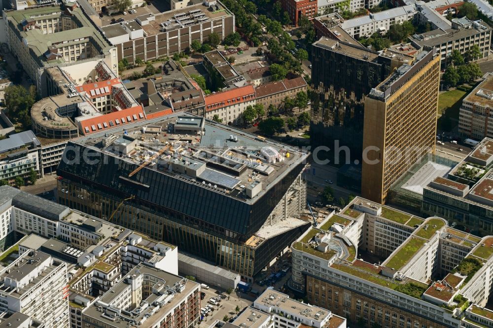 Berlin from above - Construction site with pile foundation work for the foundation plate of the new building Axel Springer Campus - OMA to Krausenstrasse - Schuetzenstrasse in Berlin