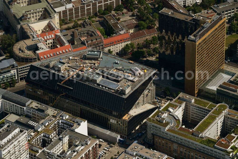 Berlin from the bird's eye view: Construction site with pile foundation work for the foundation plate of the new building Axel Springer Campus - OMA to Krausenstrasse - Schuetzenstrasse in Berlin