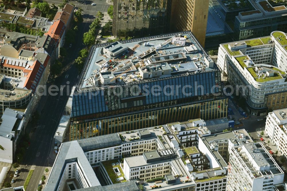 Aerial photograph Berlin - Construction site with pile foundation work for the foundation plate of the new building Axel Springer Campus - OMA to Krausenstrasse - Schuetzenstrasse in Berlin