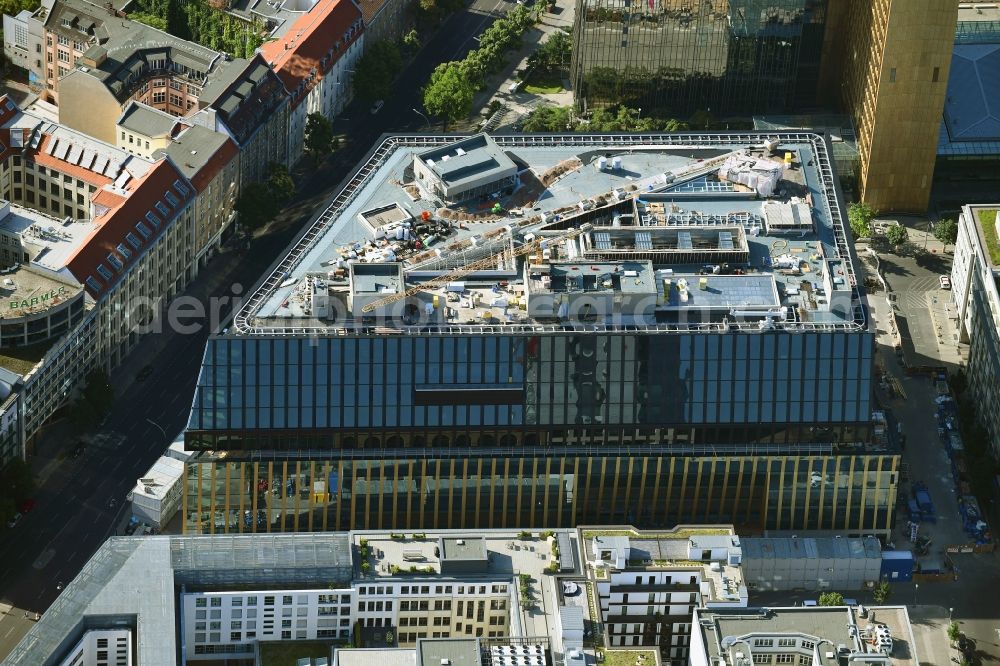 Berlin from above - Construction site with pile foundation work for the foundation plate of the new building Axel Springer Campus - OMA to Krausenstrasse - Schuetzenstrasse in Berlin