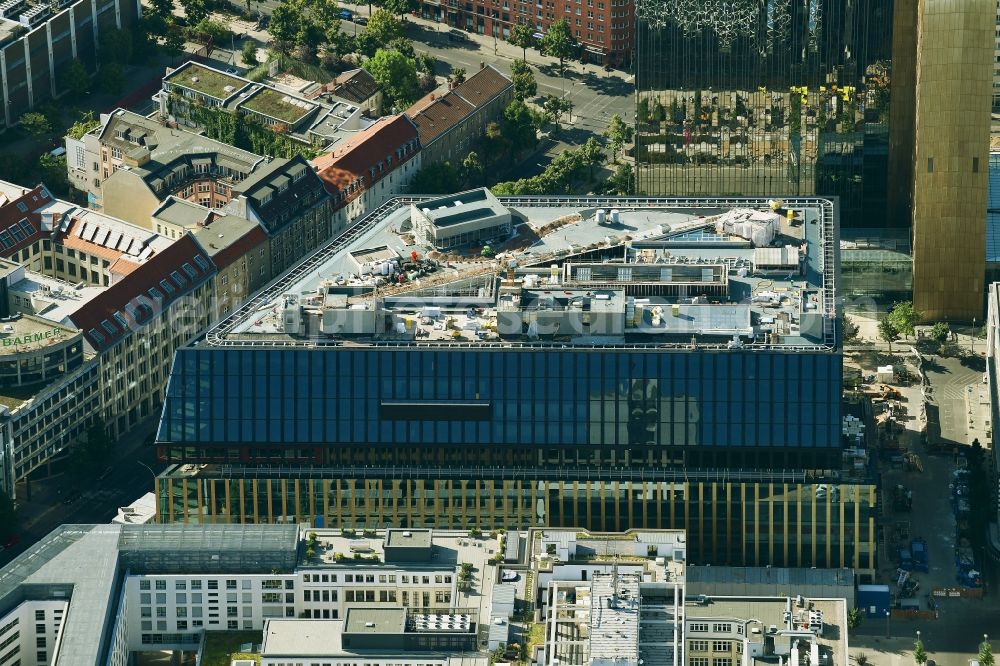 Aerial image Berlin - Construction site with pile foundation work for the foundation plate of the new building Axel Springer Campus - OMA to Krausenstrasse - Schuetzenstrasse in Berlin