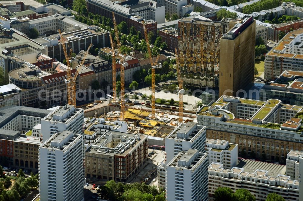 Berlin from the bird's eye view: Construction site with pile foundation work for the foundation plate of the new building Axel Springer Campus - OMA to Krausenstrasse - Schuetzenstrasse in Berlin