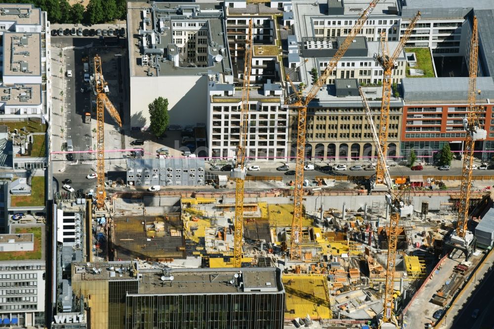 Berlin from the bird's eye view: Construction site with pile foundation work for the foundation plate of the new building Axel Springer Campus - OMA to Krausenstrasse - Schuetzenstrasse in Berlin