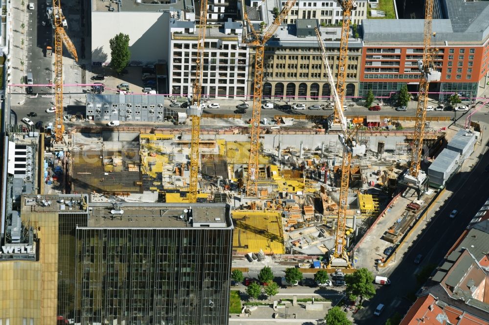 Aerial image Berlin - Construction site with pile foundation work for the foundation plate of the new building Axel Springer Campus - OMA to Krausenstrasse - Schuetzenstrasse in Berlin