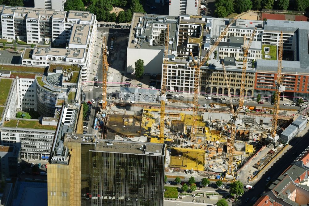 Berlin from above - Construction site with pile foundation work for the foundation plate of the new building Axel Springer Campus - OMA to Krausenstrasse - Schuetzenstrasse in Berlin