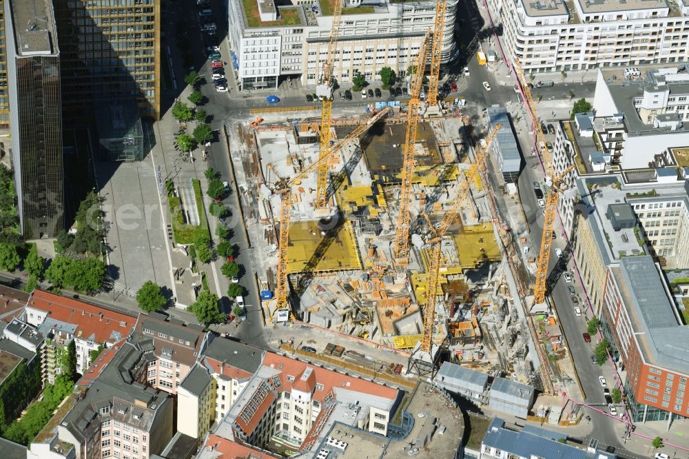 Berlin from above - Construction site with pile foundation work for the foundation plate of the new building Axel Springer Campus - OMA to Krausenstrasse - Schuetzenstrasse in Berlin