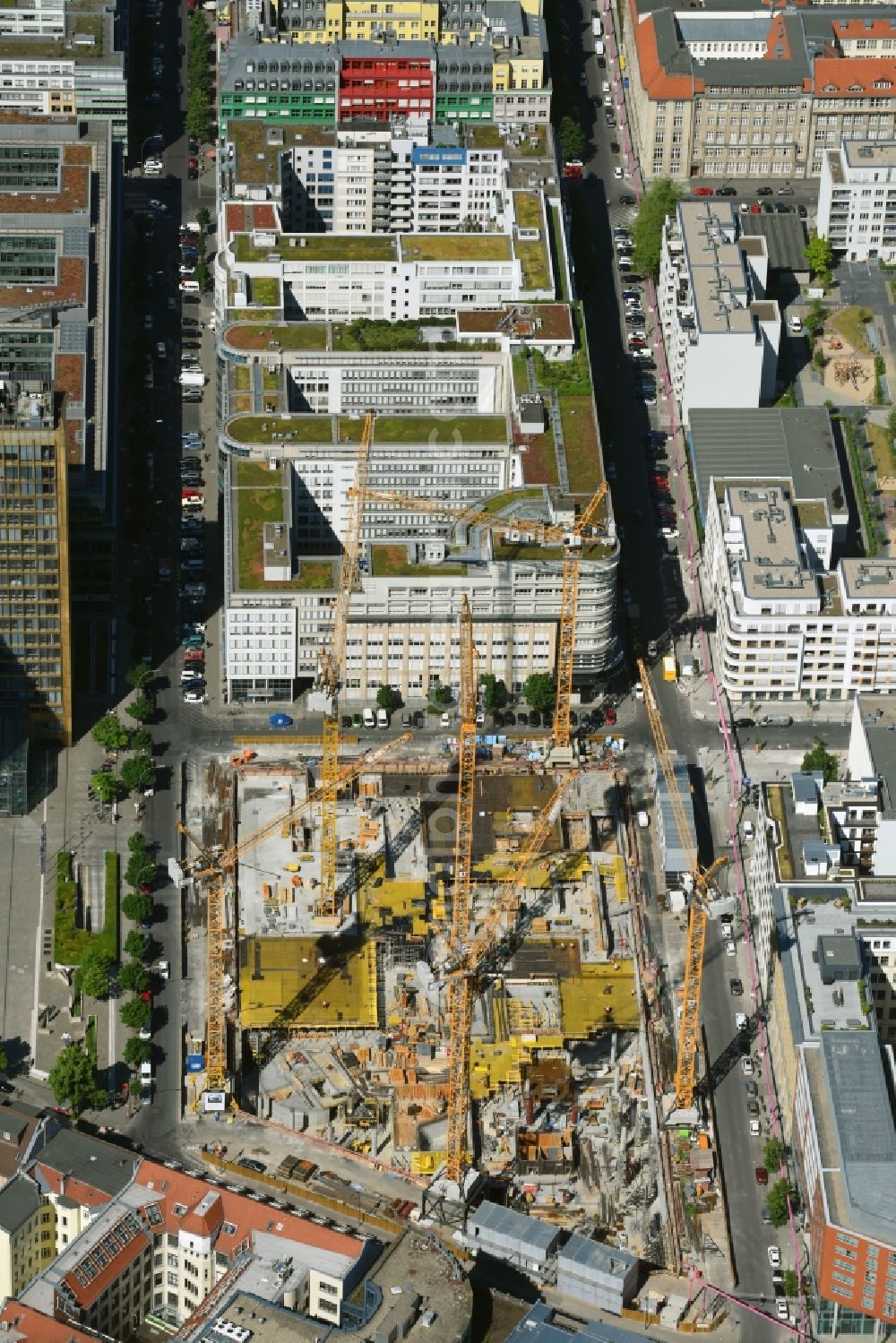 Berlin from the bird's eye view: Construction site with pile foundation work for the foundation plate of the new building Axel Springer Campus - OMA to Krausenstrasse - Schuetzenstrasse in Berlin