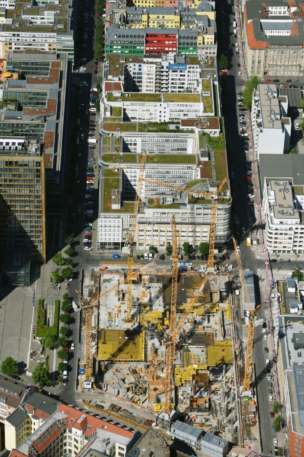 Aerial image Berlin - Construction site with pile foundation work for the foundation plate of the new building Axel Springer Campus - OMA to Krausenstrasse - Schuetzenstrasse in Berlin