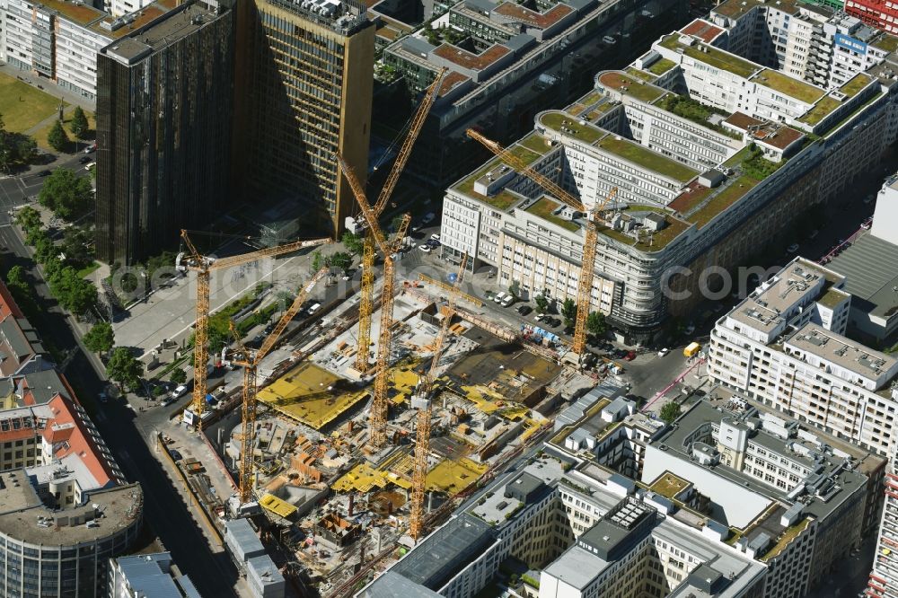 Berlin from above - Construction site with pile foundation work for the foundation plate of the new building Axel Springer Campus - OMA to Krausenstrasse - Schuetzenstrasse in Berlin