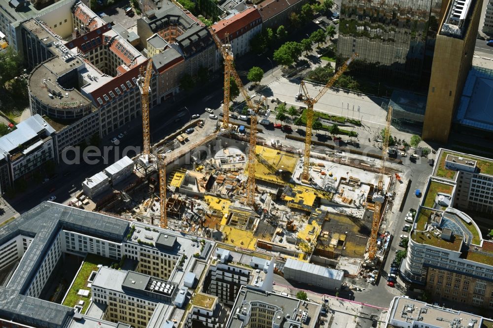 Berlin from above - Construction site with pile foundation work for the foundation plate of the new building Axel Springer Campus - OMA to Krausenstrasse - Schuetzenstrasse in Berlin