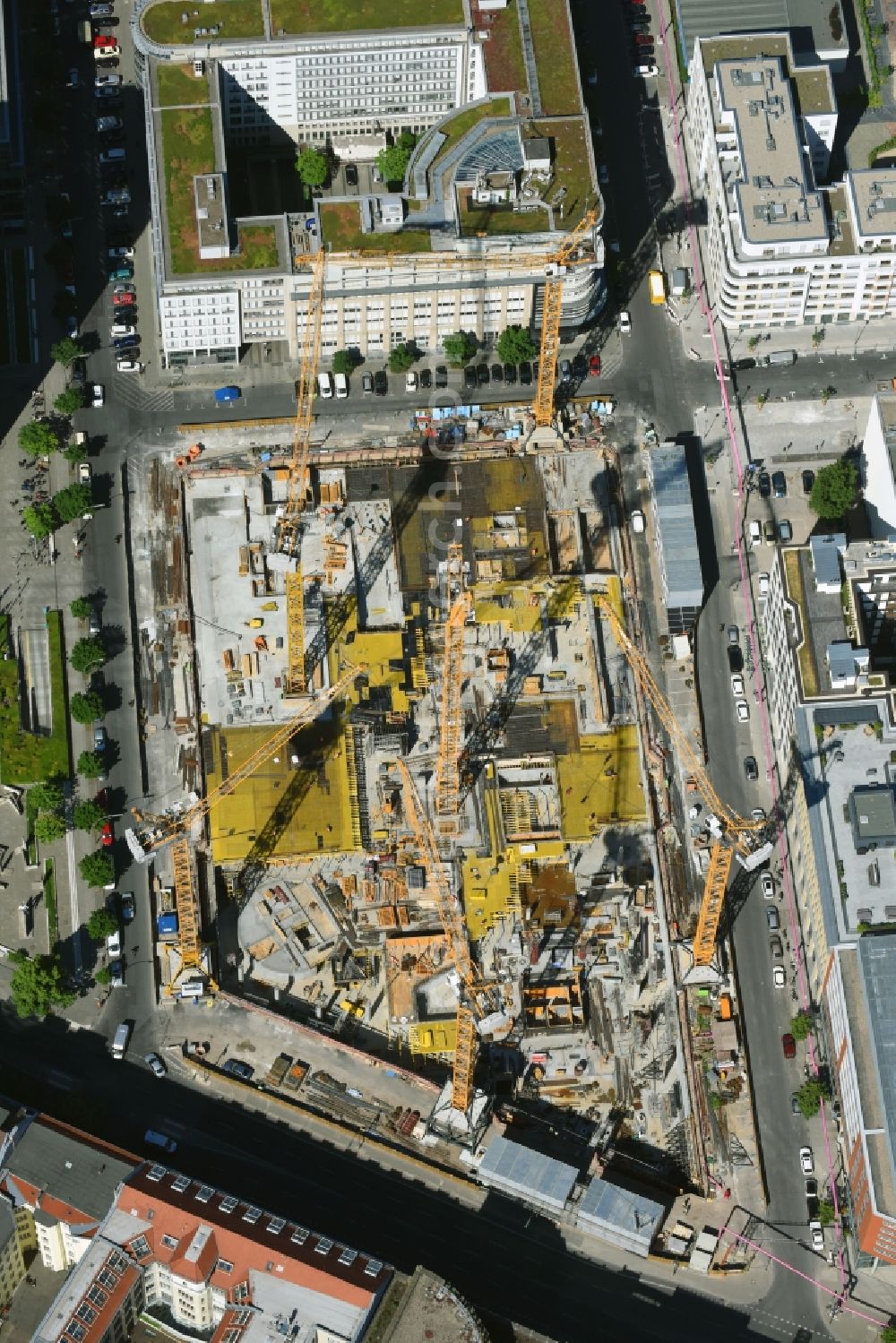 Berlin from the bird's eye view: Construction site with pile foundation work for the foundation plate of the new building Axel Springer Campus - OMA to Krausenstrasse - Schuetzenstrasse in Berlin