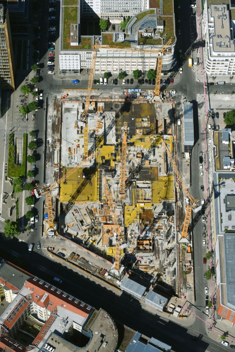 Aerial image Berlin - Construction site with pile foundation work for the foundation plate of the new building Axel Springer Campus - OMA to Krausenstrasse - Schuetzenstrasse in Berlin