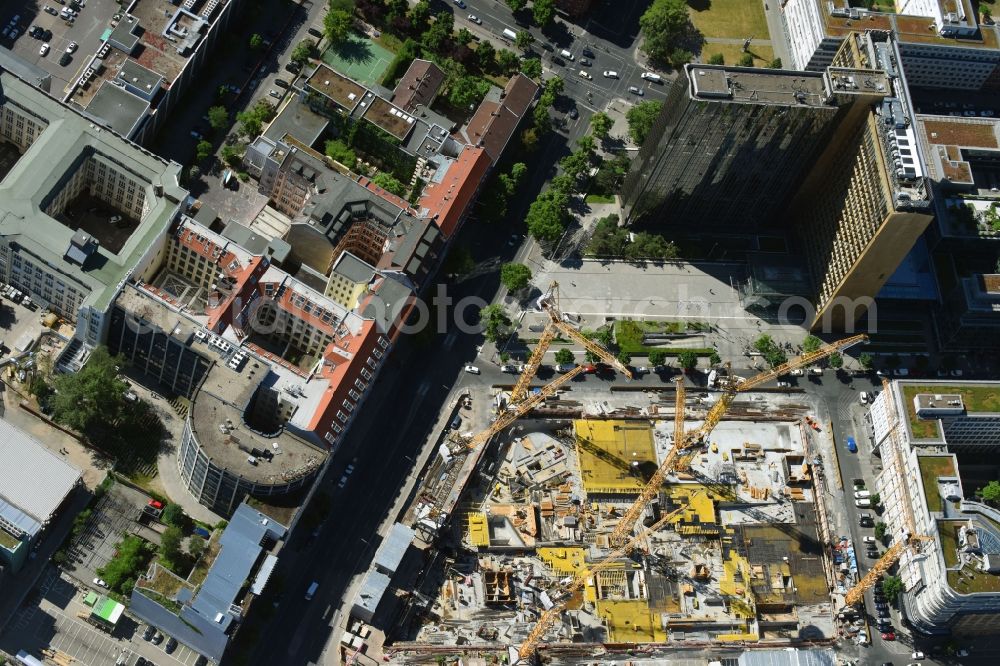 Berlin from above - Construction site with pile foundation work for the foundation plate of the new building Axel Springer Campus - OMA to Krausenstrasse - Schuetzenstrasse in Berlin