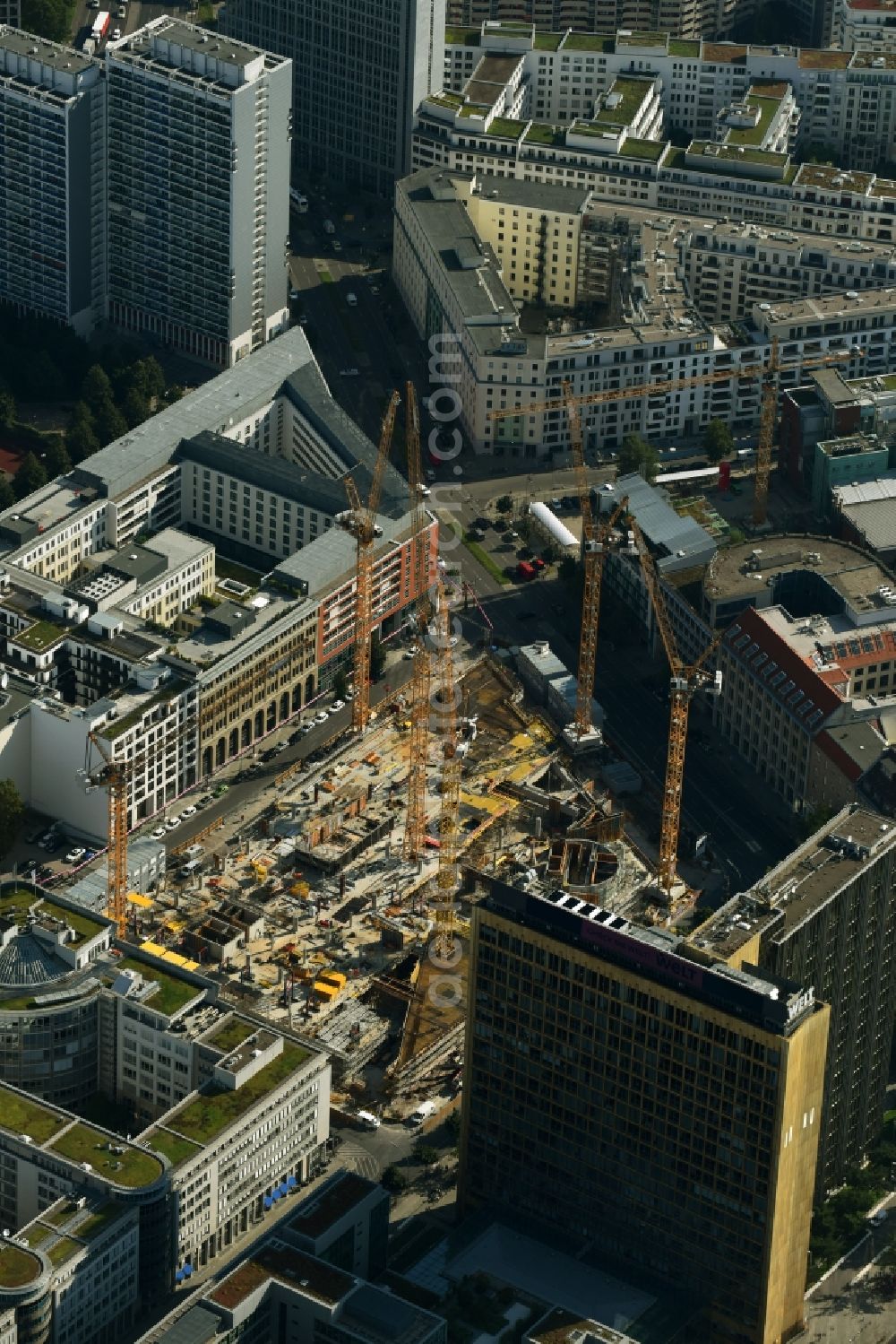 Aerial image Berlin - Construction site with pile foundation work for the foundation plate of the new building Axel Springer Campus - OMA to Krausenstrasse - Schuetzenstrasse in Berlin