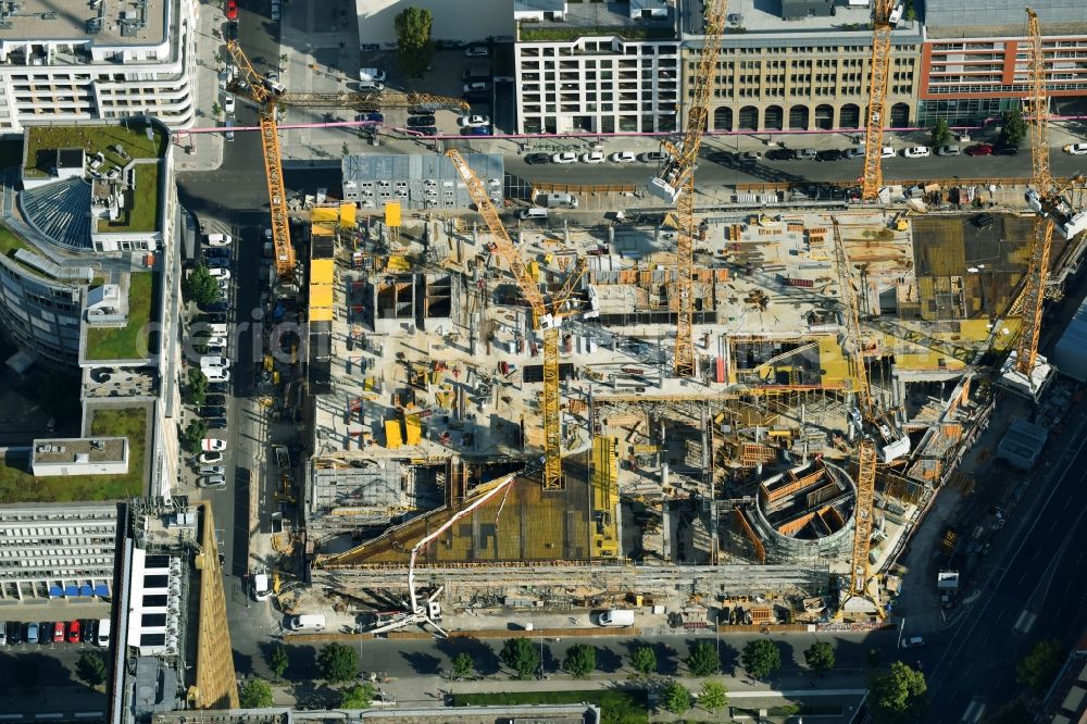 Berlin from the bird's eye view: Construction site with pile foundation work for the foundation plate of the new building Axel Springer Campus - OMA to Krausenstrasse - Schuetzenstrasse in Berlin