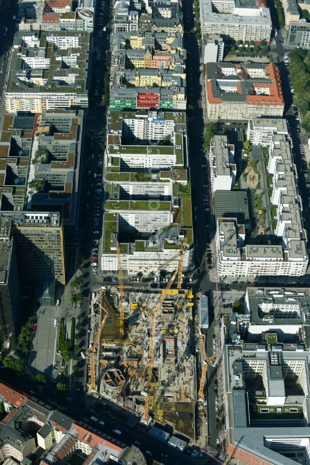 Aerial photograph Berlin - Construction site with pile foundation work for the foundation plate of the new building Axel Springer Campus - OMA to Krausenstrasse - Schuetzenstrasse in Berlin