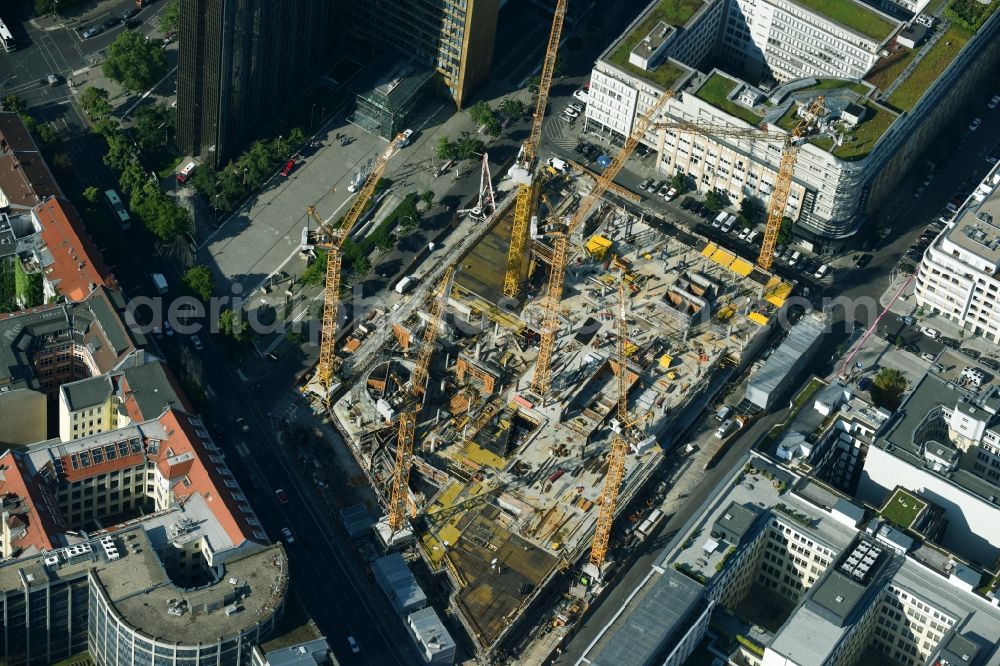 Berlin from above - Construction site with pile foundation work for the foundation plate of the new building Axel Springer Campus - OMA to Krausenstrasse - Schuetzenstrasse in Berlin