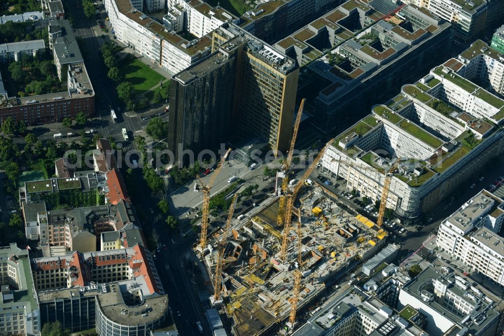 Berlin from the bird's eye view: Construction site with pile foundation work for the foundation plate of the new building Axel Springer Campus - OMA to Krausenstrasse - Schuetzenstrasse in Berlin