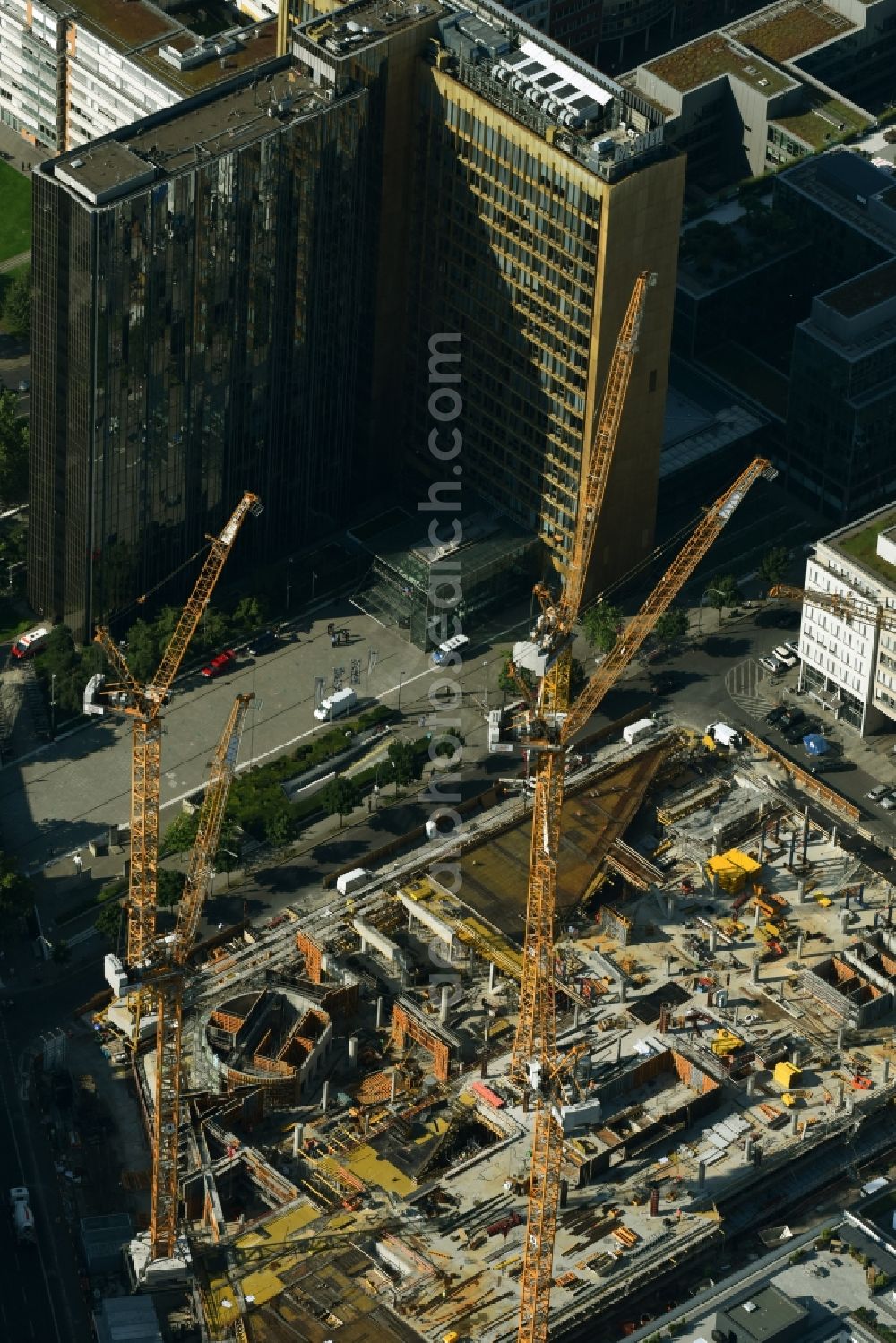 Aerial image Berlin - Construction site with pile foundation work for the foundation plate of the new building Axel Springer Campus - OMA to Krausenstrasse - Schuetzenstrasse in Berlin