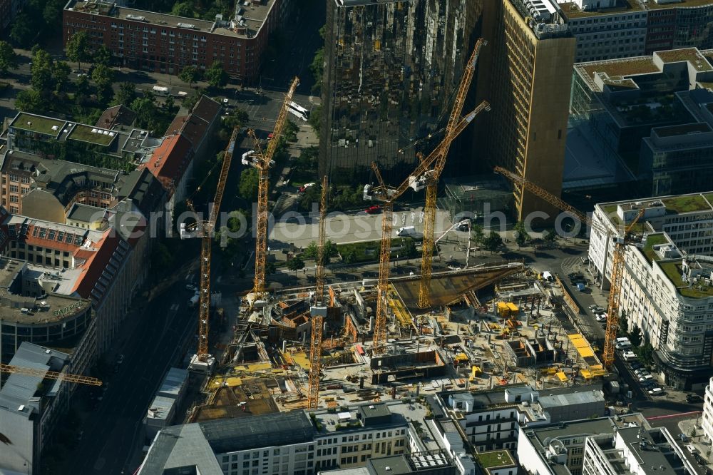 Berlin from above - Construction site with pile foundation work for the foundation plate of the new building Axel Springer Campus - OMA to Krausenstrasse - Schuetzenstrasse in Berlin