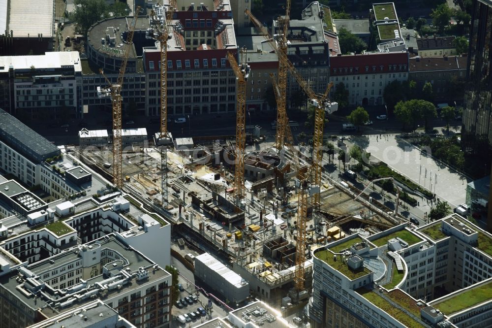 Berlin from above - Construction site with pile foundation work for the foundation plate of the new building Axel Springer Campus - OMA to Krausenstrasse - Schuetzenstrasse in Berlin