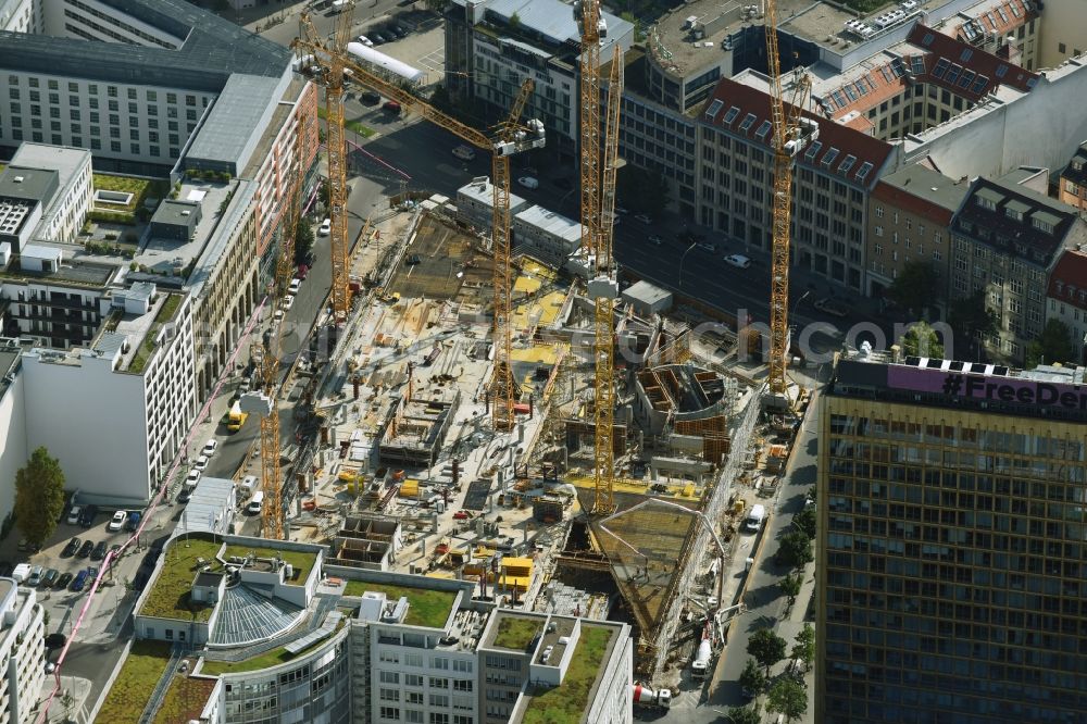 Berlin from the bird's eye view: Construction site with pile foundation work for the foundation plate of the new building Axel Springer Campus - OMA to Krausenstrasse - Schuetzenstrasse in Berlin