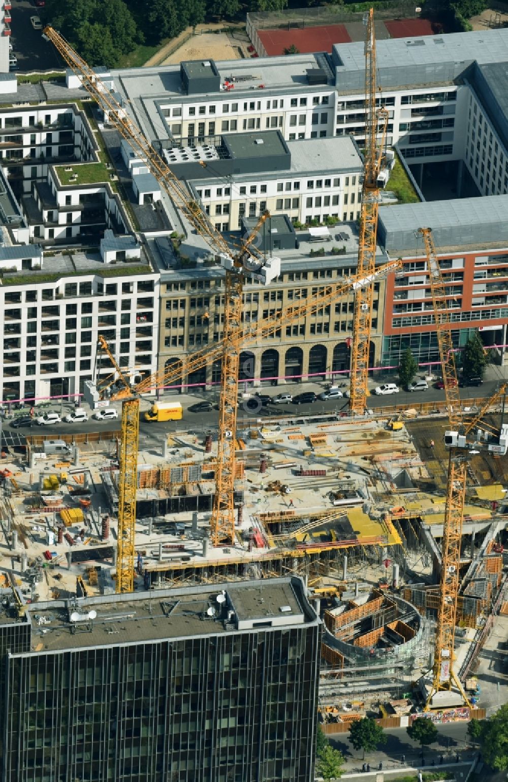 Berlin from above - Construction site with pile foundation work for the foundation plate of the new building Axel Springer Campus - OMA to Krausenstrasse - Schuetzenstrasse in Berlin