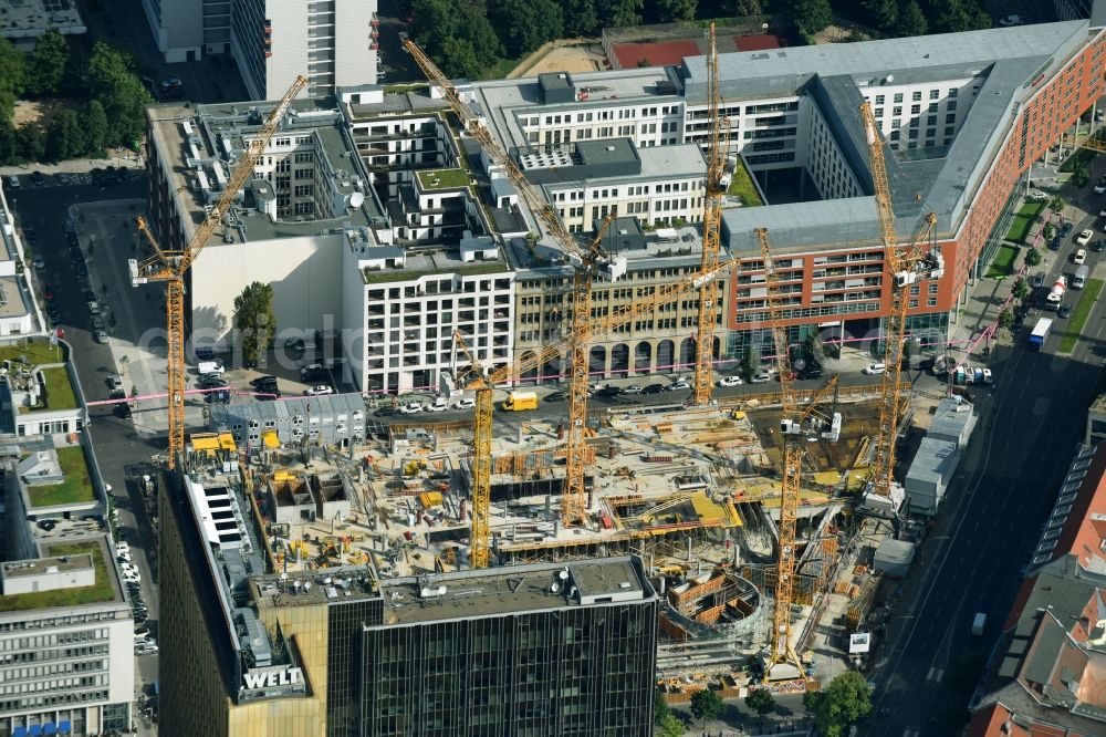 Berlin from the bird's eye view: Construction site with pile foundation work for the foundation plate of the new building Axel Springer Campus - OMA to Krausenstrasse - Schuetzenstrasse in Berlin