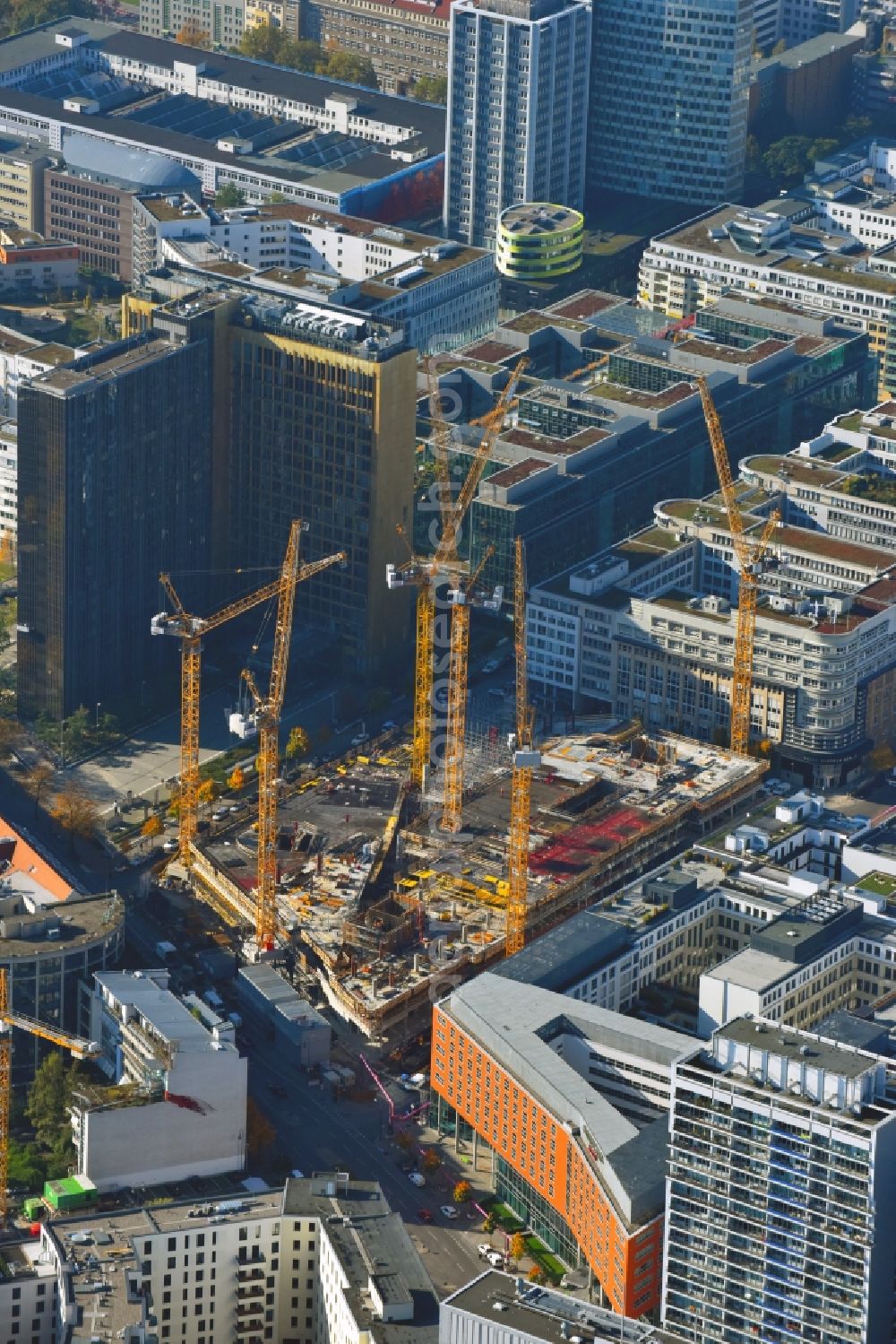 Berlin from the bird's eye view: Construction site with pile foundation work for the foundation plate of the new building Axel Springer Campus - OMA to Krausenstrasse - Schuetzenstrasse in Berlin