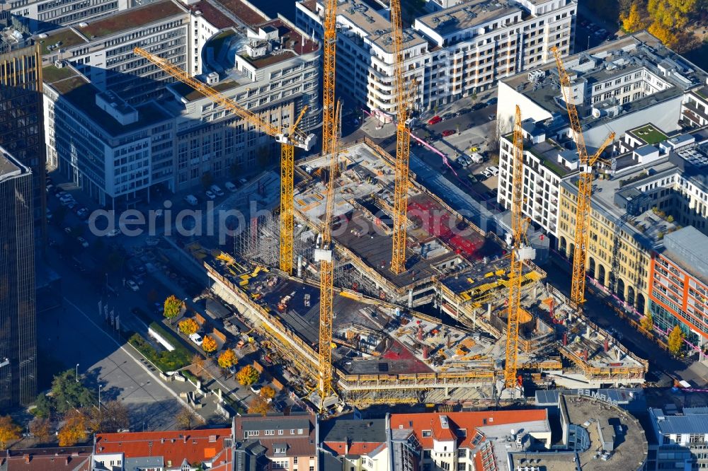 Berlin from above - Construction site with pile foundation work for the foundation plate of the new building Axel Springer Campus - OMA to Krausenstrasse - Schuetzenstrasse in Berlin