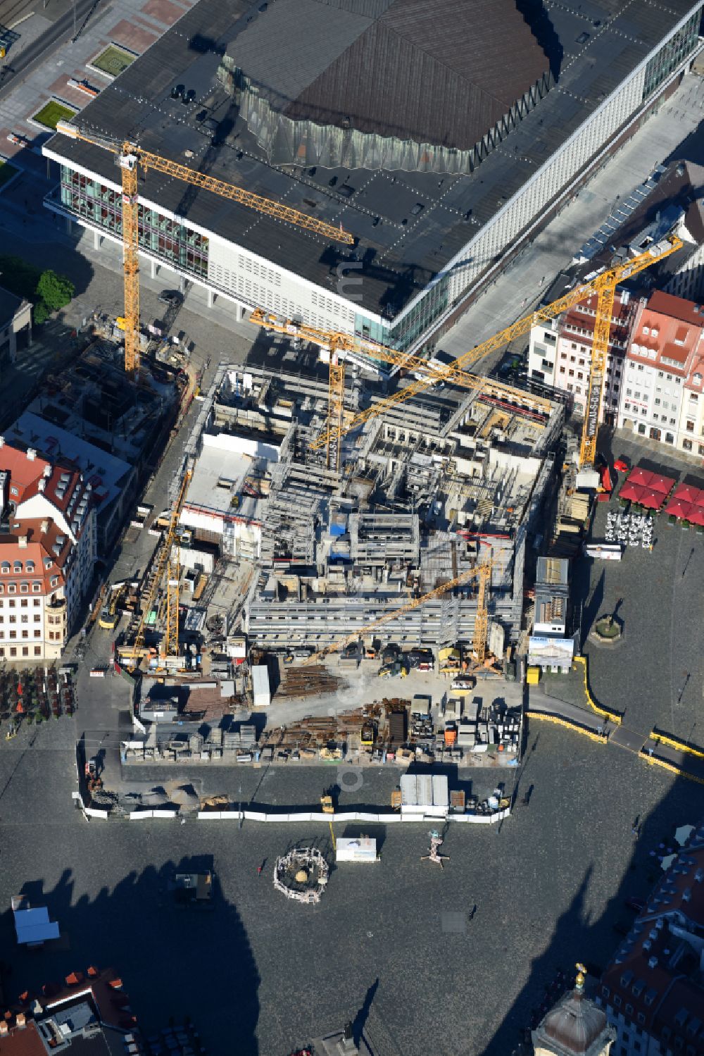 Dresden from the bird's eye view: Construction site of a new building Neumarkt - Palais of USD Immobilien GmbH in Dresden in the state Saxony