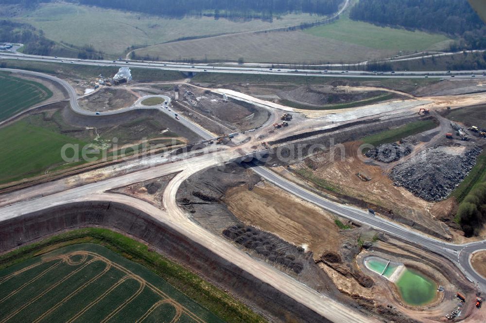 Eisenach from the bird's eye view: Blick auf die Baustelle der Ausfahrt / Anschlussstelle Eisenach-West der A4. Der Neubau ist Teil des Projekt Nordverlegung / Umfahrung Hörselberge der Autobahn E40 / A4 in Thüringen bei Eisenach. Durchgeführt werden die im Zuge dieses Projektes notwendigen Arbeiten unter an derem von den Mitarbeitern der Niederlassung Weimar der EUROVIA Verkehrsbau Union sowie der Niederlassungen Abbruch und Erdbau, Betonstraßenbau, Ingenieurbau und TECO Schallschutz der EUROVIA Beton sowie der DEGES.