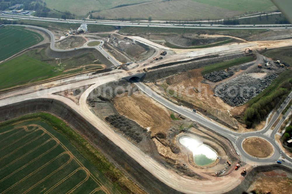 Aerial image Eisenach - Blick auf die Baustelle der Ausfahrt / Anschlussstelle Eisenach-West der A4. Der Neubau ist Teil des Projekt Nordverlegung / Umfahrung Hörselberge der Autobahn E40 / A4 in Thüringen bei Eisenach. Durchgeführt werden die im Zuge dieses Projektes notwendigen Arbeiten unter an derem von den Mitarbeitern der Niederlassung Weimar der EUROVIA Verkehrsbau Union sowie der Niederlassungen Abbruch und Erdbau, Betonstraßenbau, Ingenieurbau und TECO Schallschutz der EUROVIA Beton sowie der DEGES.