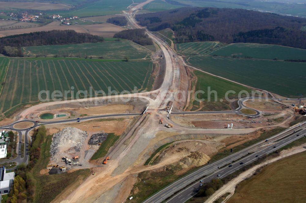 Eisenach from the bird's eye view: Blick auf die Baustelle der Ausfahrt / Anschlussstelle Eisenach-West der A4. Der Neubau ist Teil des Projekt Nordverlegung / Umfahrung Hörselberge der Autobahn E40 / A4 in Thüringen bei Eisenach. Durchgeführt werden die im Zuge dieses Projektes notwendigen Arbeiten unter an derem von den Mitarbeitern der Niederlassung Weimar der EUROVIA Verkehrsbau Union sowie der Niederlassungen Abbruch und Erdbau, Betonstraßenbau, Ingenieurbau und TECO Schallschutz der EUROVIA Beton sowie der DEGES.