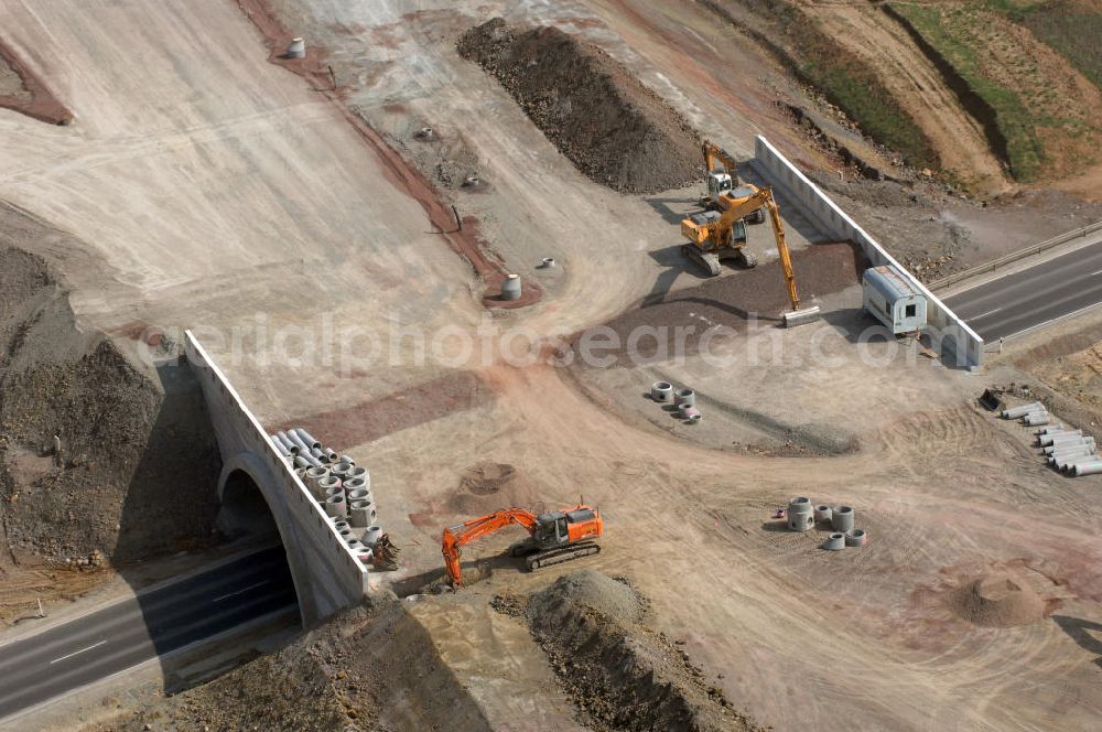 Eisenach from the bird's eye view: Blick auf die Unterführung im Zentrum der Baustelle Ausfahrt / Anschlussstelle Eisenach-West der A4. Der Neubau ist Teil des Projekt Nordverlegung / Umfahrung Hörselberge der Autobahn E40 / A4 in Thüringen bei Eisenach. Durchgeführt werden die im Zuge dieses Projektes notwendigen Arbeiten unter an derem von den Mitarbeitern der Niederlassung Weimar der EUROVIA Verkehrsbau Union sowie der Niederlassungen Abbruch und Erdbau, Betonstraßenbau, Ingenieurbau und TECO Schallschutz der EUROVIA Beton sowie der DEGES.